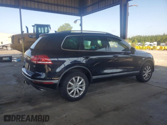 2017 Volkswagen Touareg Sport with VIN WVGEF7BP8HD000237, listed as a Copart auction lot 52714074 with 107,463 mi miles and . Bid and sale history available at DreamBid. Image 3.