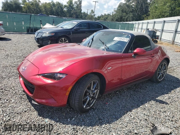 2020 Mazda MX-5 Miata Grand Touring z VIN JM1NDAD79L0415751, wystawiony jako Copart lot #71864574 z przebiegiem Nie podano mil oraz Szkoda całkowita • Salvage title. Historia ofert i sprzedaży dostępna na DreamBid. Obrazek 1.