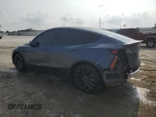 2022 Tesla Model Y Performance with VIN 7SAYGDEF4NF447462, listed as a Copart auction lot 58306595 with 61,671 mi miles and Non repairable. Bid and sale history available at DreamBid. Image 2.