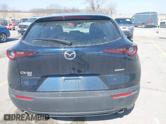 2023 Mazda CX-30 S with VIN 3MVDMBAM6PM579780, listed as a IAAI auction lot 41780720 with 32,603 mi miles and . Bid and sale history available at DreamBid. Image 16.