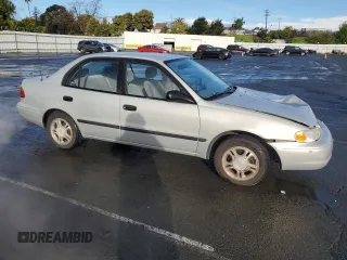 2002 Chevrolet Prizm z VIN 1Y1SK52842Z404089, wystawiony jako Copart lot #49103545 z przebiegiem 134 794 mil mil oraz Szkoda całkowita • Salvage title. Historia ofert i sprzedaży dostępna na DreamBid. Obrazek 4.