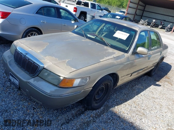 1999 Mercury Grand Marquis GS z VIN 2MEFM74W6XX626426, wystawiony jako IAAI lot #42231219 z przebiegiem 121 406 mil mil oraz . Historia ofert i sprzedaży dostępna na DreamBid. Obrazek 2.