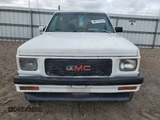1994 GMC Jimmy Diamond Edition Luxury z VIN 1GKDT13W5R2503916, wystawiony jako Copart lot #54717215 z przebiegiem 99 991 mil mil oraz Szkody całkowita. Historia ofert i sprzedaży dostępna na DreamBid. Obrazek 5.