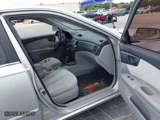 2007 Kia Optima LX with VIN KNAGE123175135348, listed as a IAAI auction lot 41887004 with 149,094 mi miles. Bid and sale history available at carsss.com. Image 5.
