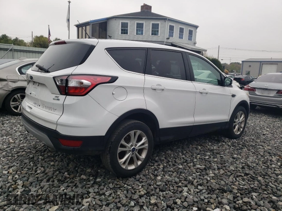 2017 Ford Escape SE with VIN 1FMCU9GDXHUD44286, listed as a Copart auction lot 54864485 with 138,212 mi miles and Clean Title. Bid and sale history available at carsss.com. Image 3.