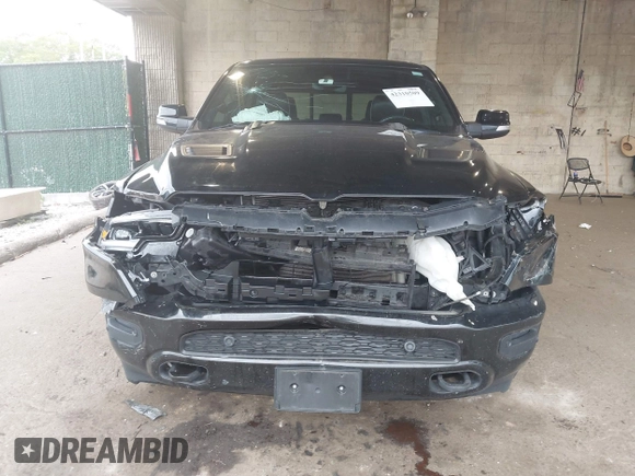 2020 Ram 1500 Limited with VIN 1C6SRFHT2LN147306, listed as a IAAI auction lot 42310509 with 74,087 mi miles and . Bid and sale history available at DreamBid. Image 13.