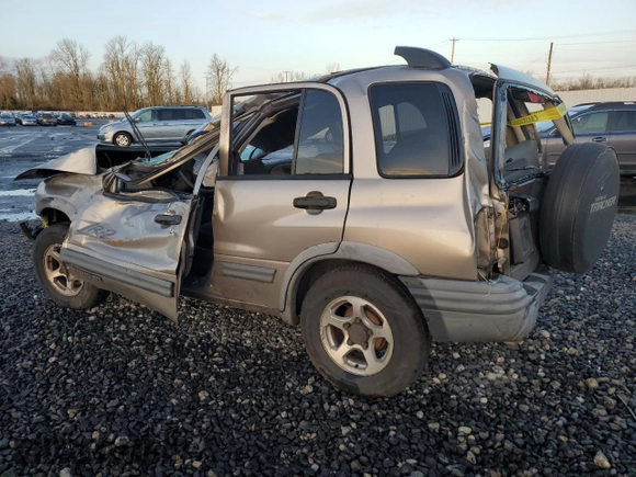 2003 Chevrolet Tracker ZR2 z VIN 2CNBJ734736913357, wystawiony jako Copart lot #86546884 z przebiegiem Nie podano mil oraz Nie do naprawy • Non repairable. Historia ofert i sprzedaży dostępna na DreamBid. Obrazek 2.