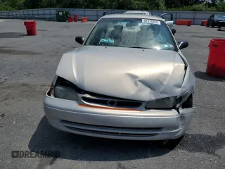 1999 Toyota Corolla VE z VIN 2T1BR12E3XC107587, wystawiony jako Copart lot #62314265 z przebiegiem 143 734 mil mil oraz Szkoda całkowita • Salvage title. Historia ofert i sprzedaży dostępna na DreamBid. Obrazek 5.