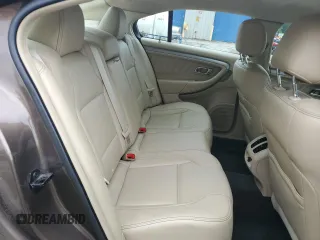 2015 Ford Taurus SEL z VIN 1FAHP2E84FG102075, wystawiony jako Copart lot #59740265 z przebiegiem 90 669 mil mil oraz Szkoda całkowita • Salvage title. Historia ofert i sprzedaży dostępna na DreamBid. Obrazek 10.