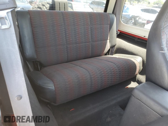 1999 Jeep Wrangler Sport with VIN 1J4FY19S7XP401120, listed as a Copart auction lot 64233665 with 129,708 mi miles and Salvage title. Bid and sale history available at DreamBid. Image 10.