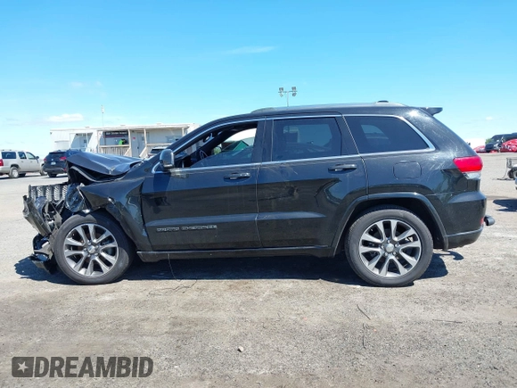 2017 Jeep Grand Cherokee Overland with VIN 1C4RJFCG0HC844713, listed as a IAAI auction lot 42293301 with 83,791 mi miles and . Bid and sale history available at DreamBid. Image 14.