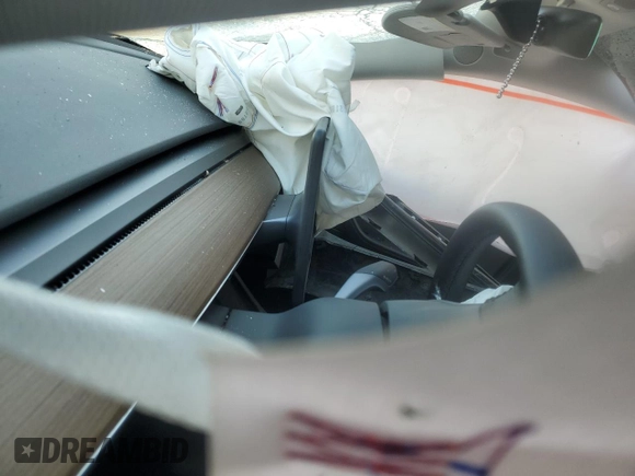 2024 Tesla Model Y Long Range with VIN 7SAYGDEE6RF063230, listed as a Copart auction lot 42872535 with Not Provided miles and Salvage Title. Bid and sale history available at DreamBid. Image 9.