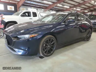 2019 Mazda Mazda3 Hatchback w/Premium Pkg with VIN JM1BPBNM1K1143984, listed as a Copart auction lot 88112455 with 130,558 mi miles and Clean Title. Bid and sale history available at carsss.com. Image 1.