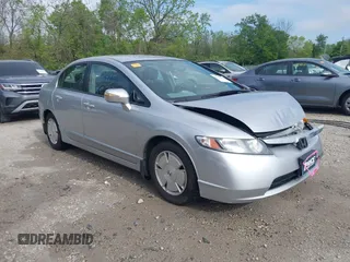2007 Honda Civic z VIN JHMFA36267S028464, wystawiony jako IAAI lot #42215413 z przebiegiem 121 682 mil mil oraz . Historia ofert i sprzedaży dostępna na DreamBid. Obrazek 1.