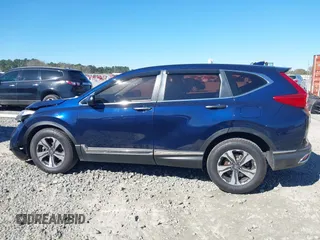2018 Honda CR-V LX with VIN 2HKRW5H31JH411364, listed as a IAAI auction lot 41825257 with 135,468 mi miles and . Bid and sale history available at DreamBid. Image 14.