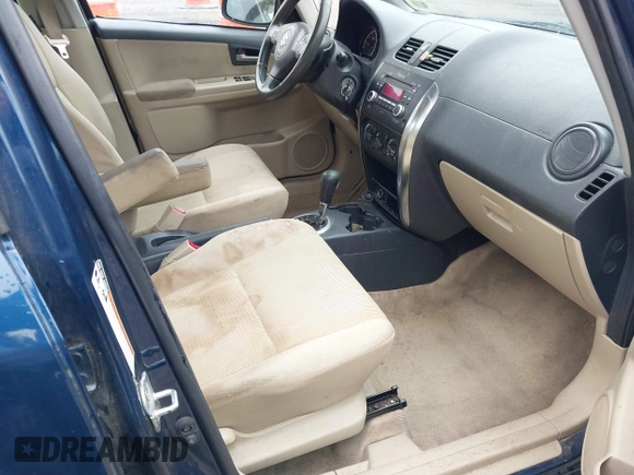 2011 Suzuki SX4 LE with VIN JS2YC5A23B6304713, listed as a IAAI auction lot 41997287 with 114,024 mi miles. Bid and sale history available at carsss.com. Image 5.
