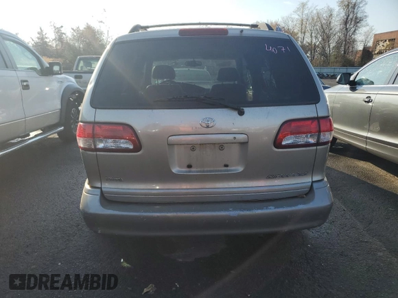 2002 Toyota Sienna LE with VIN 4T3ZF13C52U458553, listed as a Copart auction lot 77957754 with 164,058 mi miles and Salvage Title. Bid and sale history available at carsss.com. Image 6.