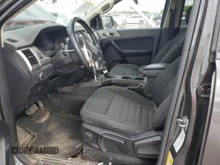 2019 Ford Ranger XL with VIN 1FTER4FH7KLB21853, listed as a Copart auction lot 54586515 with 97,758 mi miles and Salvage title. Bid and sale history available at DreamBid. Image 7.