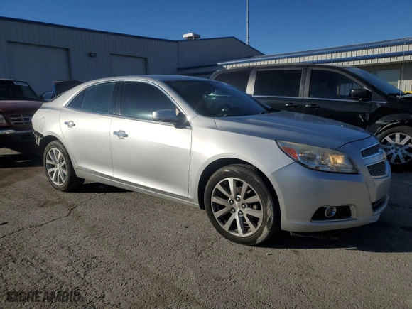 2013 Chevrolet Malibu LTZ with VIN 1G11H5SA1DF230254, listed as a Copart auction lot 88349045 with 135,480 mi miles and Salvage Title. Bid and sale history available at carsss.com. Image 4.