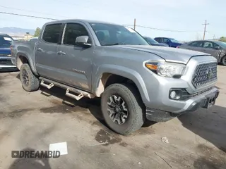 2020 Toyota Tacoma SR5 with VIN 3TMCZ5AN1LM324828, listed as a IAAI auction lot 40977362 with 33,906 mi miles and . Bid and sale history available at DreamBid. Image 1.