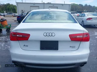 2014 Audi A6 Prestige with VIN WAUHGAFCXEN091050, listed as a IAAI auction lot 42524560 with 169,575 mi miles and . Bid and sale history available at DreamBid. Image 16.