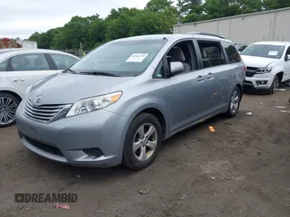 2015 Toyota Sienna LE AAS with VIN 5TDKK3DC0FS588089, listed as a IAAI auction lot 42501791 with 190,322 mi miles and . Bid and sale history available at DreamBid. Image 20.
