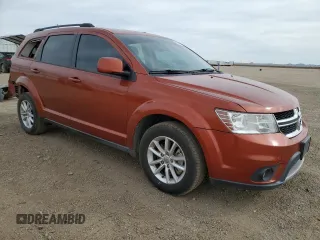 2013 Dodge Journey SXT with VIN 3C4PDCBG9DT710666, listed as a Copart auction lot 86851234 with 165,171 mi miles and Salvage title. Bid and sale history available at DreamBid. Image 4.