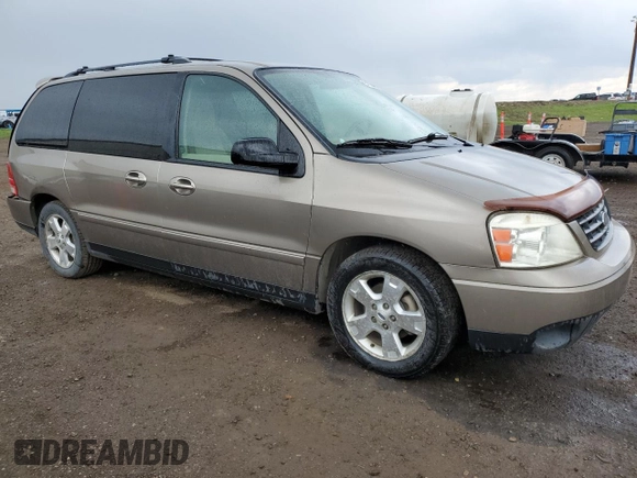 2005 Ford Freestar z VIN 2FMDA57275BA59115, wystawiony jako Copart lot #57058445 z przebiegiem 100 831 mil mil oraz Szkoda całkowita • Salvage title. Historia ofert i sprzedaży dostępna na DreamBid. Obrazek 4.
