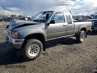 1989 Toyota Pickup DLX z VIN JT4VN13D0K0001910, wystawiony jako Copart lot #77413274 z przebiegiem 311 223 mil mil oraz Szkoda całkowita • Salvage title. Historia ofert i sprzedaży dostępna na DreamBid. Obrazek 1.