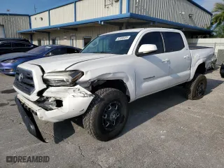 2016 Toyota Tacoma SR with VIN 5TFCZ5AN7GX010875, listed as a Copart auction lot 52496485 with 96,409 mi miles and Salvage Title. Bid and sale history available at carsss.com. Image 1.