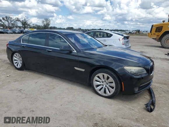 2011 BMW 7 Series with VIN WBAKX8C57BC198326, listed as a Copart auction lot 69985174 with 142,353 mi miles and Clean title. Bid and sale history available at DreamBid. Image 4.