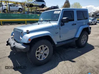 2012 Jeep Wrangler Arctic z VIN 1C4AJWBGXCL156600, wystawiony jako Copart lot #56369065 z przebiegiem 216 808 mil mil oraz Szkoda całkowita • Salvage title. Historia ofert i sprzedaży dostępna na DreamBid. Obrazek 1.
