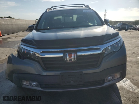 2018 Honda Ridgeline RTL-E с VIN 5FPYK3F74JB009474, выставлен на аукционе Copart как лот 49156615 с пробегом 121 045 миль миль и Списание • Salvage title. История ставок и продаж доступна на DreamBid. Изображение 5.