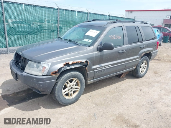 2004 Jeep Grand Cherokee Laredo z VIN 1J4GW48S34C399804, wystawiony jako IAAI lot #42163326 z przebiegiem 203 278 mil mil oraz . Historia ofert i sprzedaży dostępna na DreamBid. Obrazek 17.