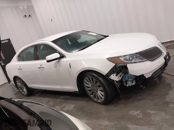 2014 Lincoln MKS with VIN 1LNHL9EK5EG605750, listed as a IAAI auction lot 41565308 with 167,835 mi miles. Bid and sale history available at carsss.com. Image 13.