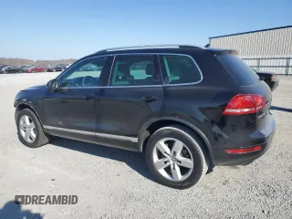 2012 Volkswagen Touareg Sport с VIN WVGEF9BP5CD011457, выставлен на аукционе Copart как лот 46785645 с пробегом 108 840 миль миль и Списание • Salvage title. История ставок и продаж доступна на DreamBid. Изображение 2.