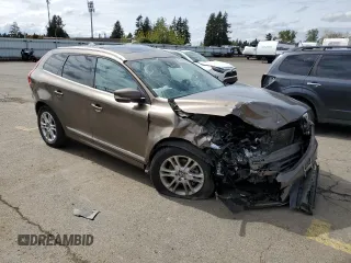 2015 Volvo XC60 T5 z VIN YV4612RK4F2673990, wystawiony jako Copart lot #52303935 z przebiegiem 78 868 mil mil oraz Szkoda całkowita • Salvage title. Historia ofert i sprzedaży dostępna na DreamBid. Obrazek 4.