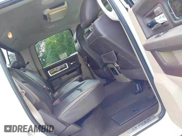 2012 Ram 2500 Laramie Longhorn with VIN 3C6UD5GL1CG121386, listed as a IAAI auction lot 42119700 with 207,173 mi miles and . Bid and sale history available at DreamBid. Image 8.