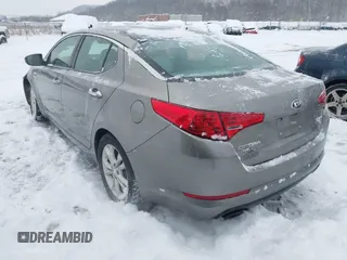 2013 Kia Optima EX with VIN 5XXGN4A70DG258168, listed as a IAAI auction lot 41209415 with 169,365 mi miles. Bid and sale history available at carsss.com. Image 3.