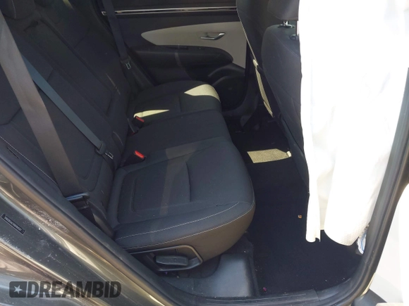 2022 Hyundai Tucson SEL with VIN 5NMJB3AEXNH144592, listed as a IAAI auction lot 42037487 with 75,651 mi miles and . Bid and sale history available at DreamBid. Image 8.