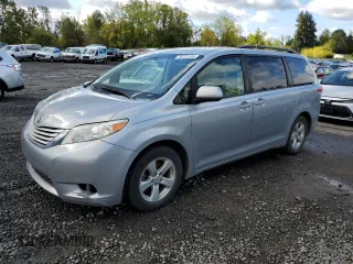 2014 Toyota Sienna LE AAS with VIN 5TDKK3DC9ES453157, listed as a Copart auction lot 76731104 with 197,090 mi miles and Salvage Title. Bid and sale history available at carsss.com. Image 1.
