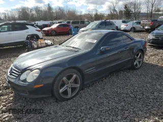2005 Mercedes-Benz SL 500 with VIN WDBSK75F05F103673, listed as a Copart auction lot 47113085 with 143,266 mi miles and Salvage Title. Bid and sale history available at DreamBid. Image 1.