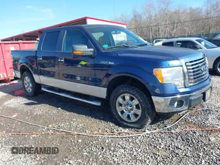 2012 Ford F-150 XL with VIN 1FTFW1EF9CFA55611, listed as a IAAI auction lot 41616943 with 103,749 mi miles. Bid and sale history available at carsss.com. Image 1.