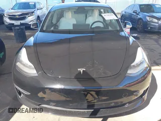 2020 Tesla Model 3 Standard Range Plus with VIN 5YJ3E1EA8LF661982, listed as a IAAI auction lot 41700109 with 30,271 mi miles and . Bid and sale history available at DreamBid. Image 11.