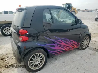 2011 Smart fortwo Pure with VIN WMEEJ3BA4BK447028, listed as a Copart auction lot 57359265 with 84,657 mi miles and Clean title. Bid and sale history available at DreamBid. Image 3.