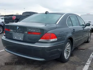 2005 BMW 7 Series 745Li with VIN WBAGN63595DS56807, listed as a IAAI auction lot 42018921 with 128,230 mi miles. Bid and sale history available at carsss.com. Image 4.