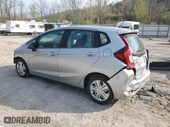 2019 Honda Fit LX z VIN 3HGGK5H41KM712693, wystawiony jako Copart lot #52069275 z przebiegiem 68 522 mil mil oraz Szkoda całkowita • Salvage title. Historia ofert i sprzedaży dostępna na DreamBid. Obrazek 2.
