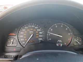 1999 Saturn SL z VIN 1G8ZK5270XZ212874, wystawiony jako Copart lot #85317464 z przebiegiem 153 477 mil mil oraz Szkoda całkowita • Salvage title. Historia ofert i sprzedaży dostępna na DreamBid. Obrazek 9.
