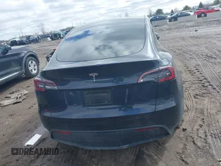 2025 Tesla Model Y Long Range with VIN 7SAYGDED3SF229605, listed as a IAAI auction lot 41726254 with Not Provided miles and . Bid and sale history available at DreamBid. Image 15.