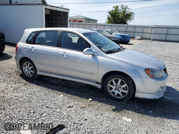 2005 Kia Spectra with VIN KNAFE162155081155, listed as a Copart auction lot 53893255 with 127,937 mi miles and Salvage Title. Bid and sale history available at carsss.com. Image 4.